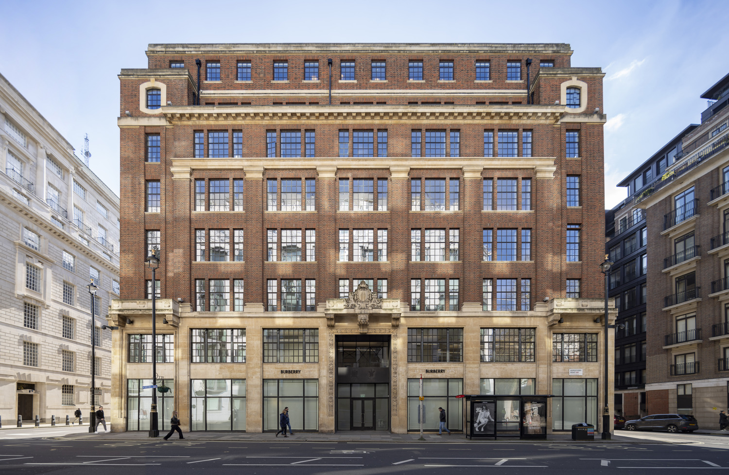 Historic multi-storey building featuring a series of windows on its facade