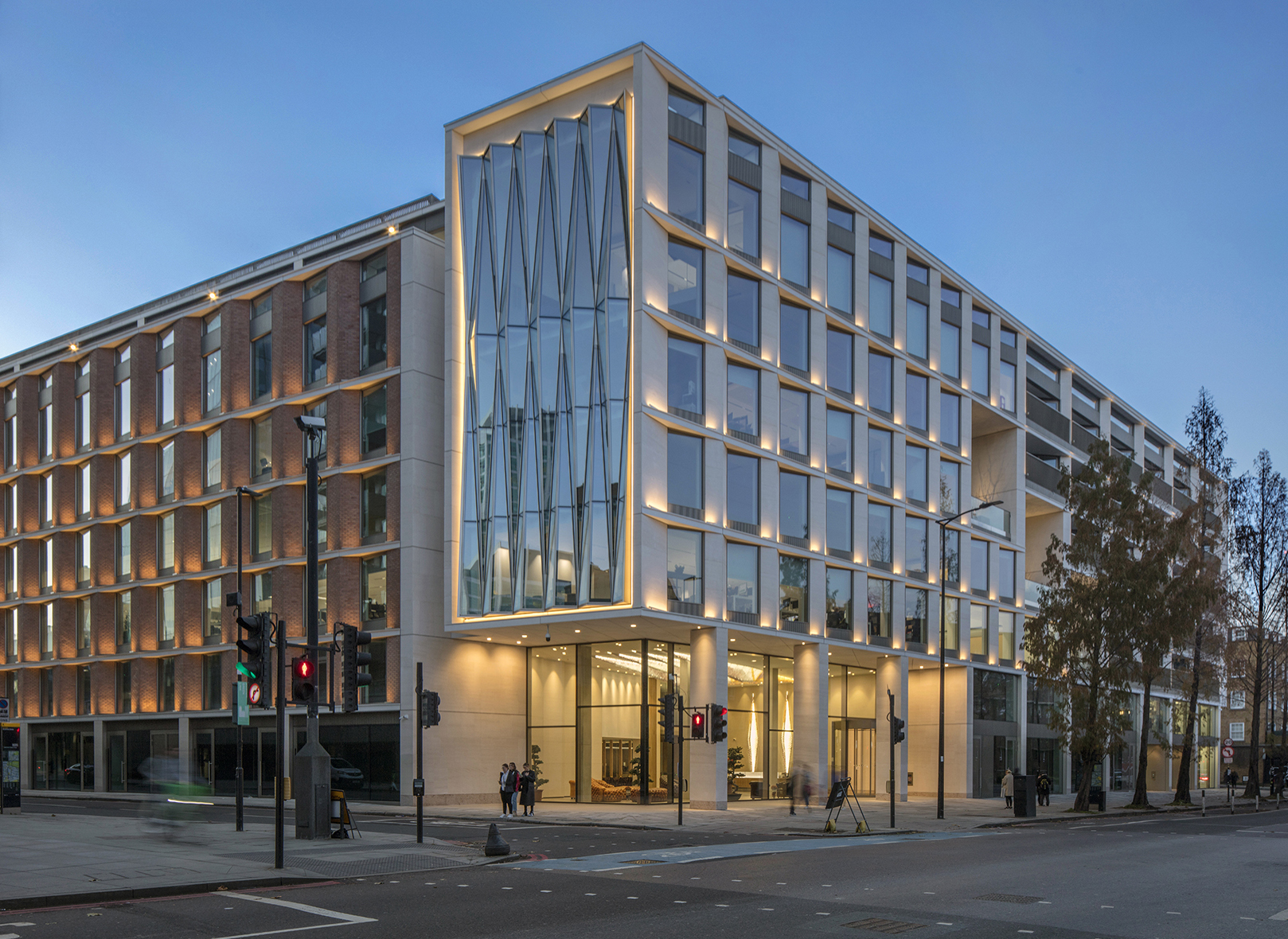 The Lantern office building has a modern facade featuring lots of glass and overlooks a main road