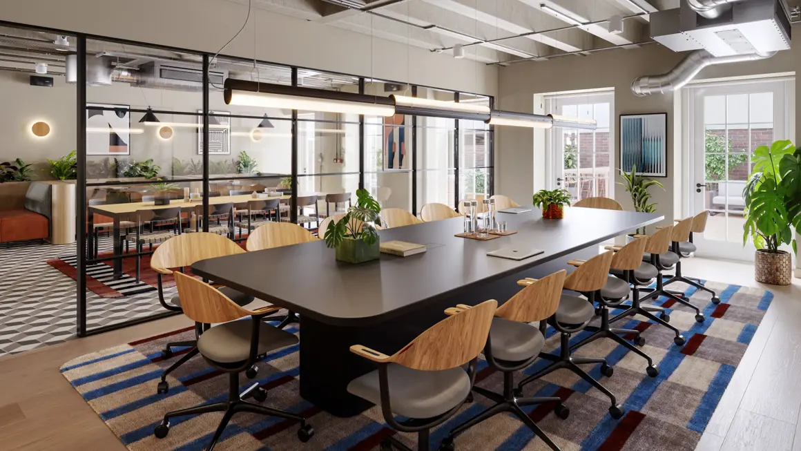 Interior of a modern office building with a large table in the middle of the room surrounded by lots of chairs