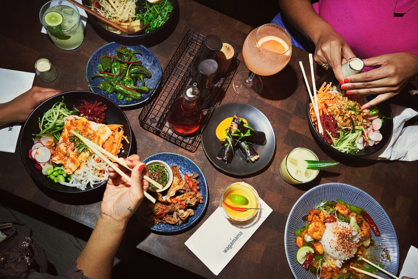 A table featuring an array of food in bowls