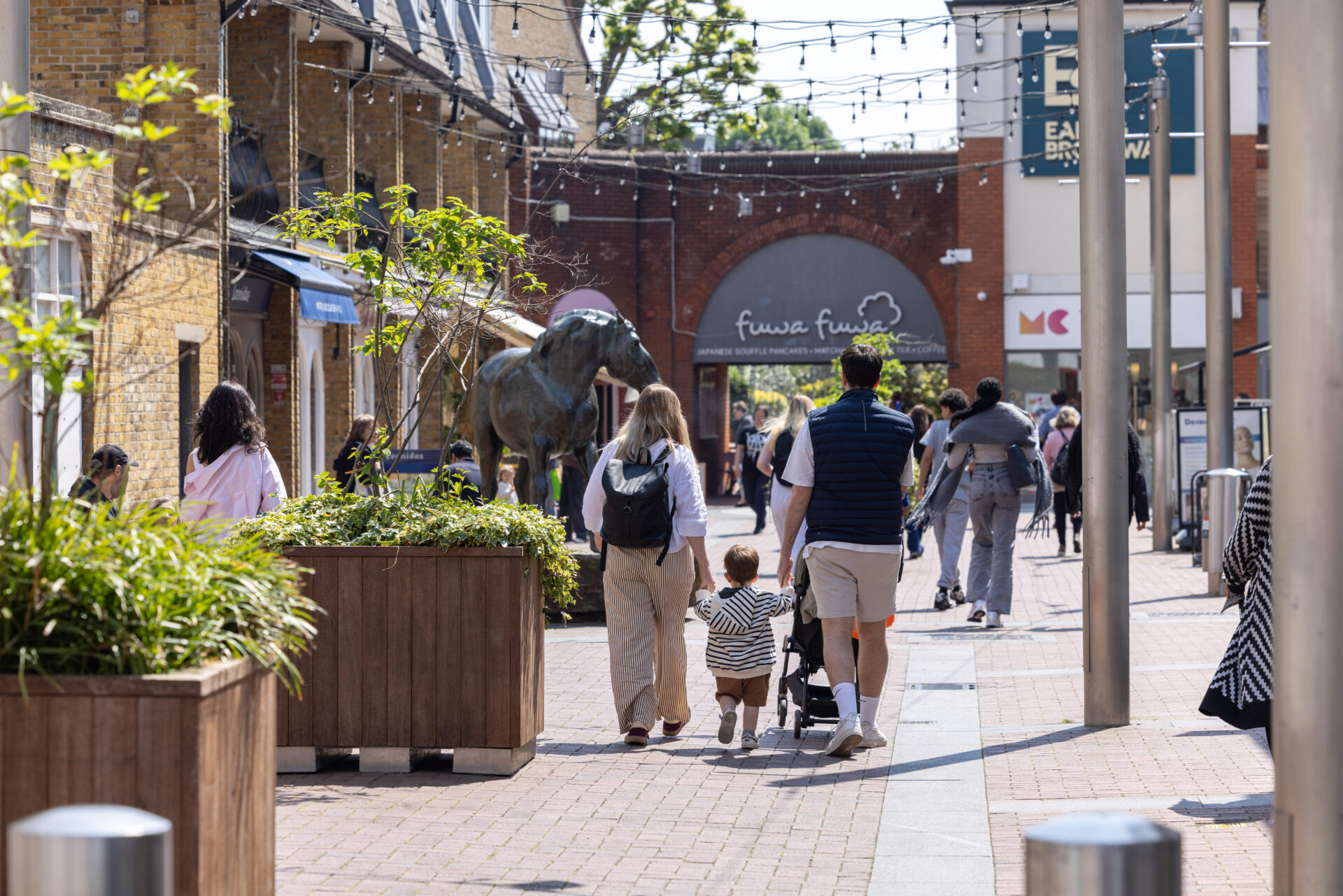 A paved area full of pedestrians