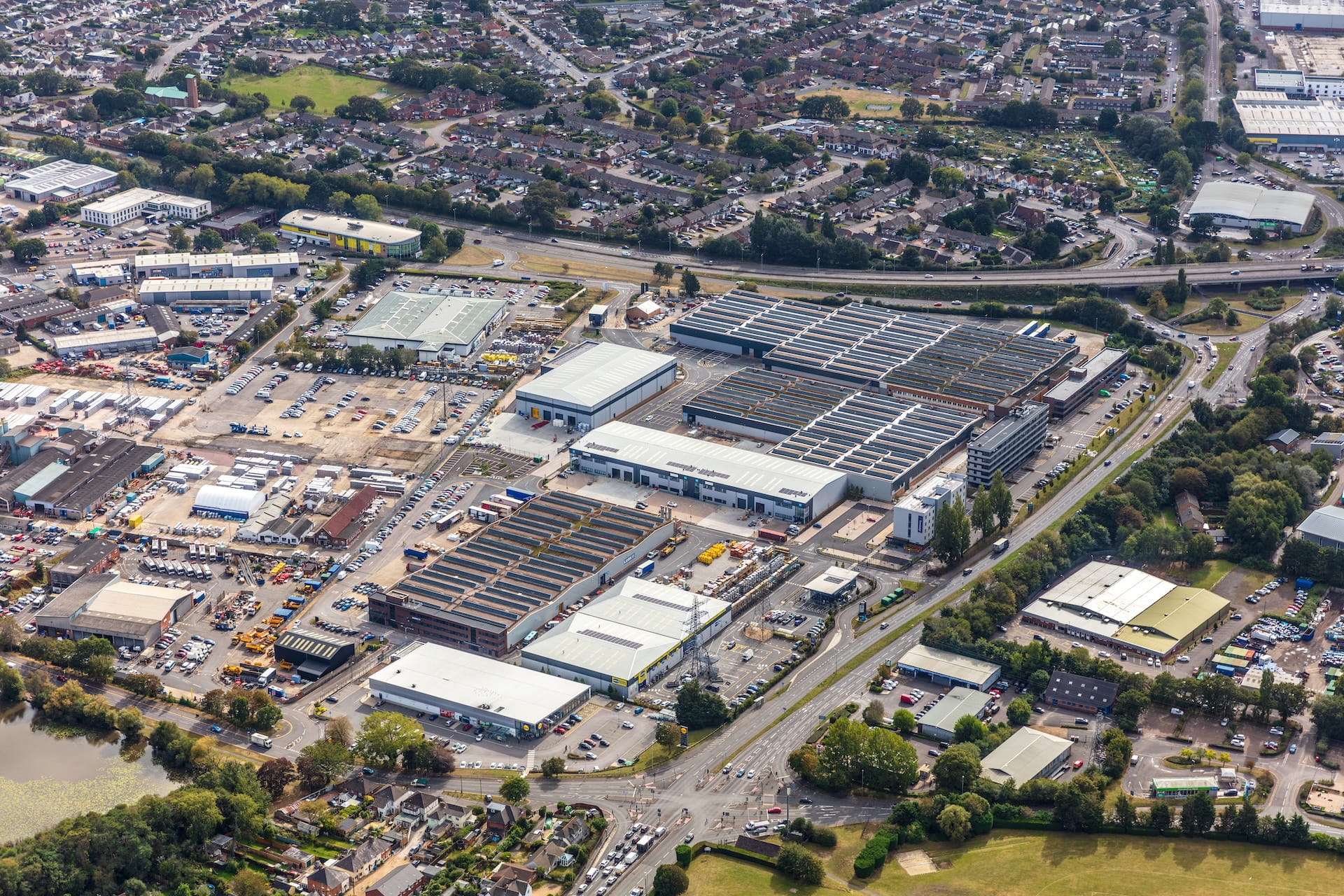 Aerial view of an industrial estate featuring lots of different warehouses