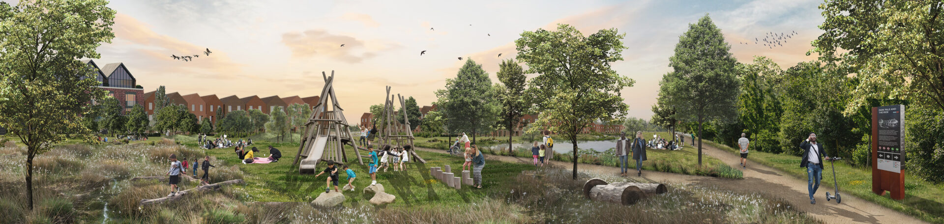 A large landscaped green area featuring trees and a lake with children playing on climbing frames and people walking on footpaths. A large housing development is in the background