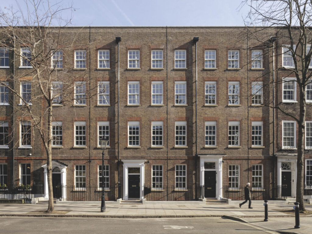 A row of Georgian office buildings in London featuring their original facades