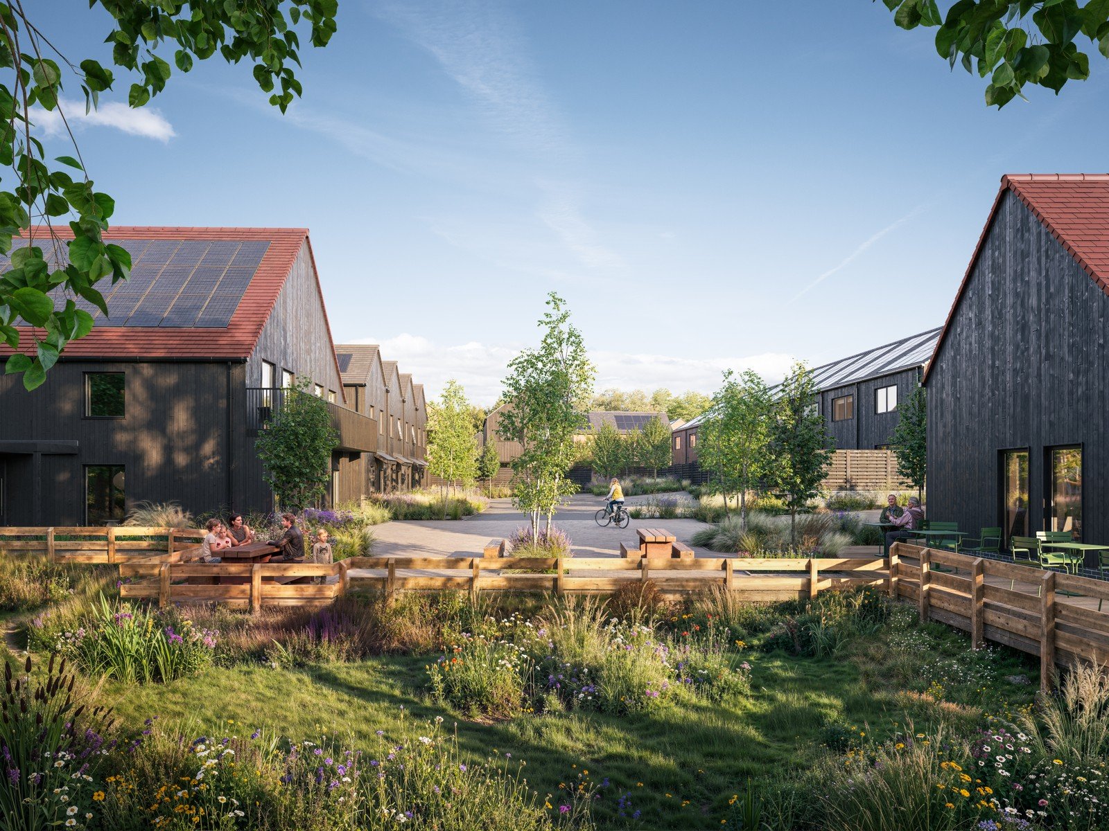 CGI of a residential development featuring a series of buildings and green planted space
