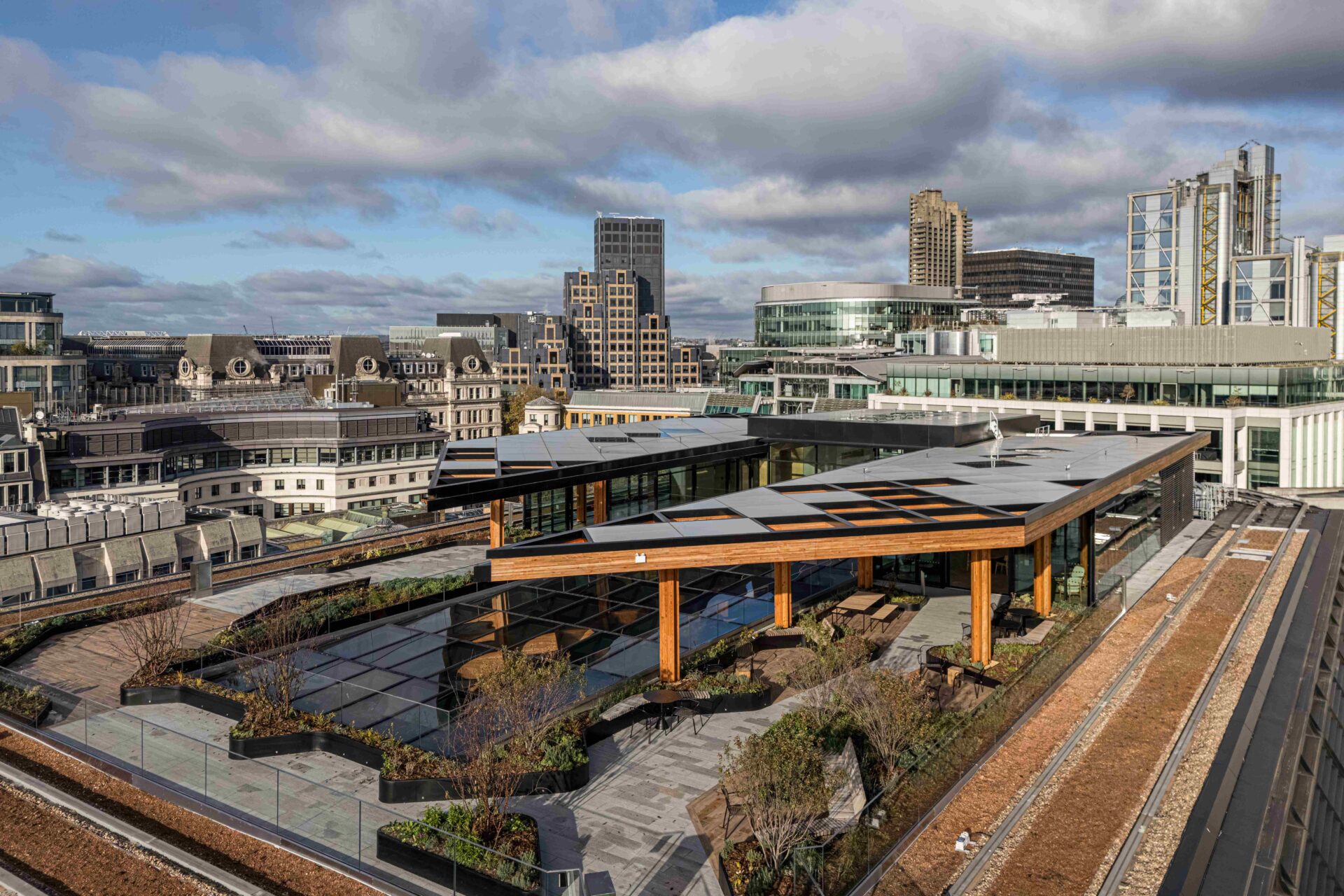 Roof terrace of a building with towers in the background