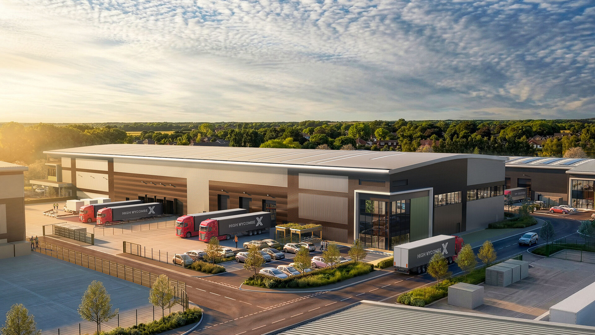 CGI of an industrial estate with vans and cars parked in front