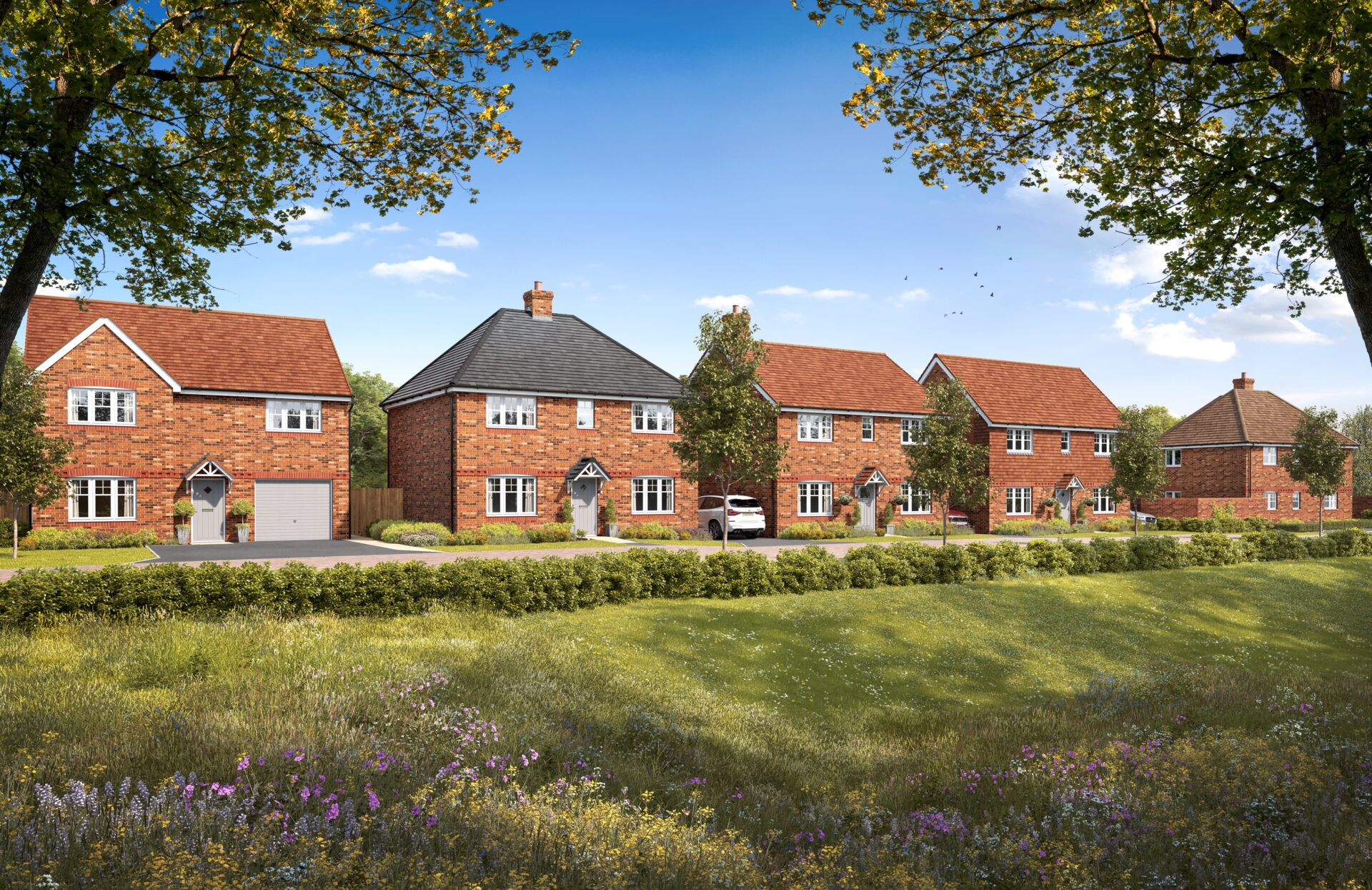 CGI of a row of homes with green fields and wild flowers in the foreground