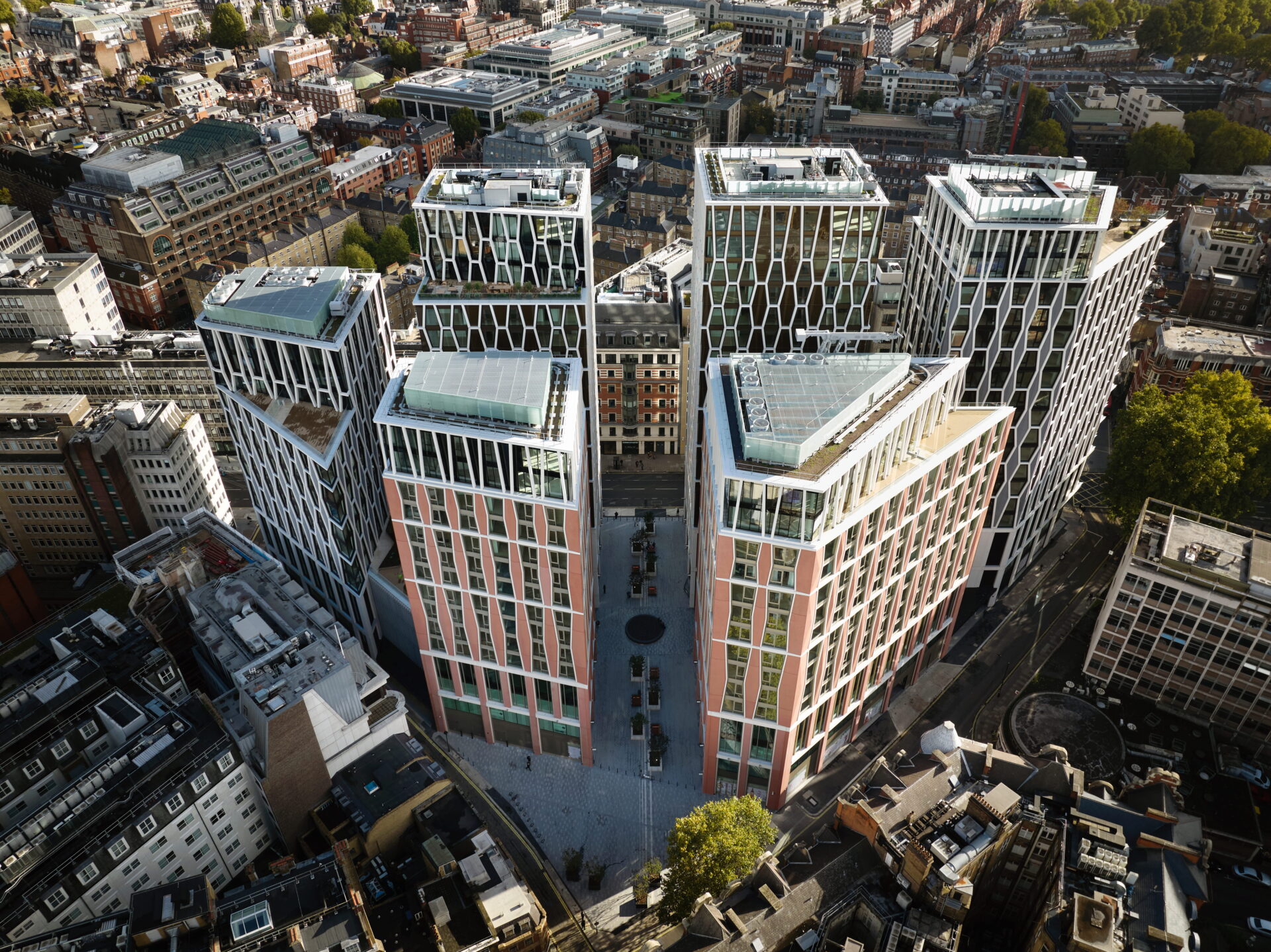 Aerial view of a series of high rise buildings surrounded by smaller buildings