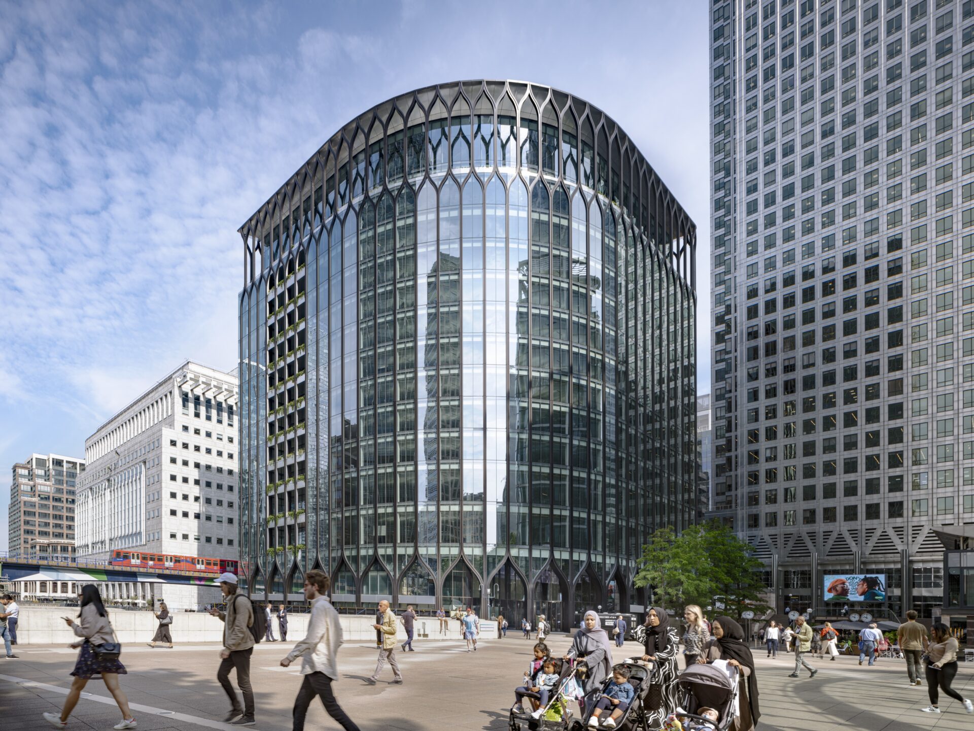 A glass office building stood alongside a larger glass tower
