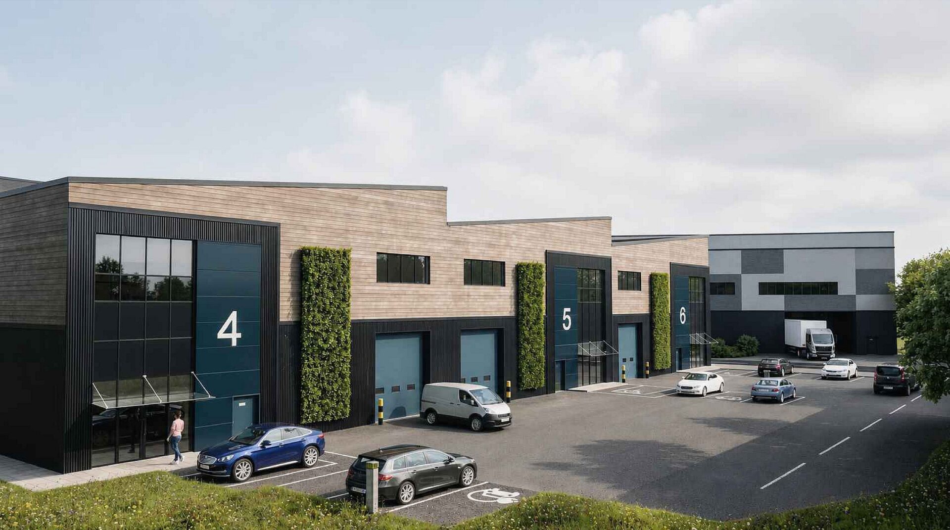 CGI view of a series of numbered industrial units with car parking in front