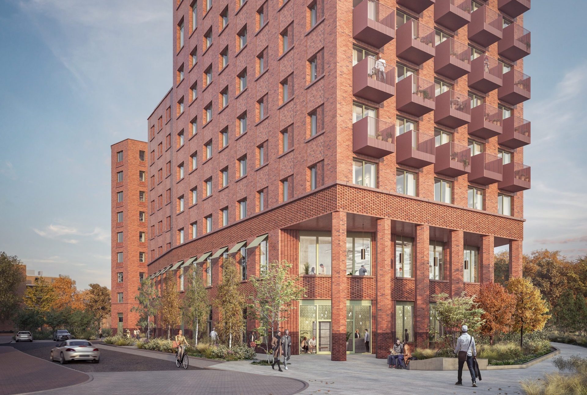 Artist’s impression of a red-brick residential tower with balconies and landscaped public space
