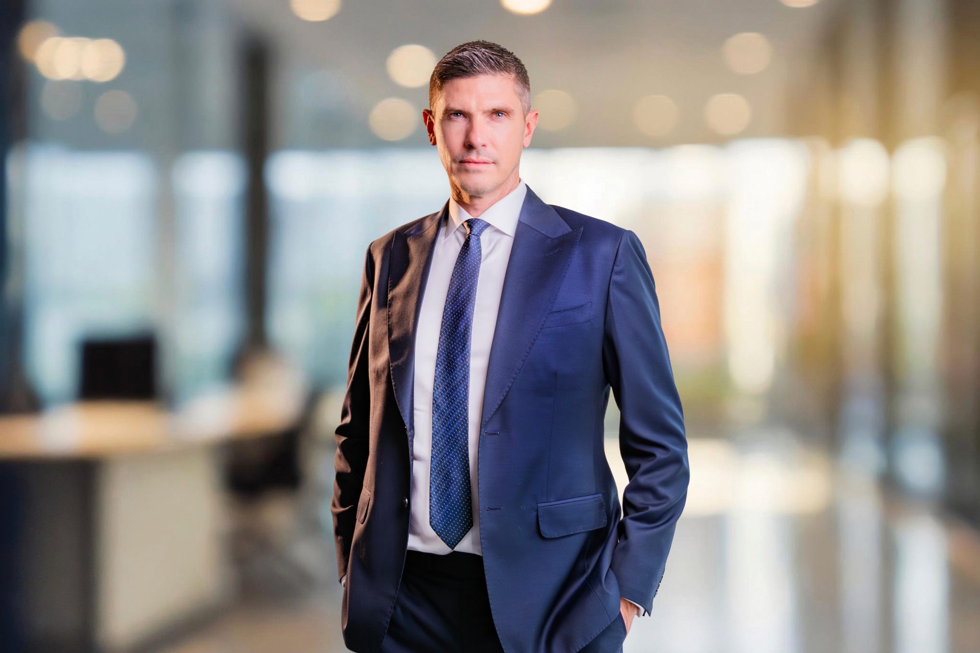 Greg Stockton, Savills’ new Middle East investment sales head, standing in a modern office