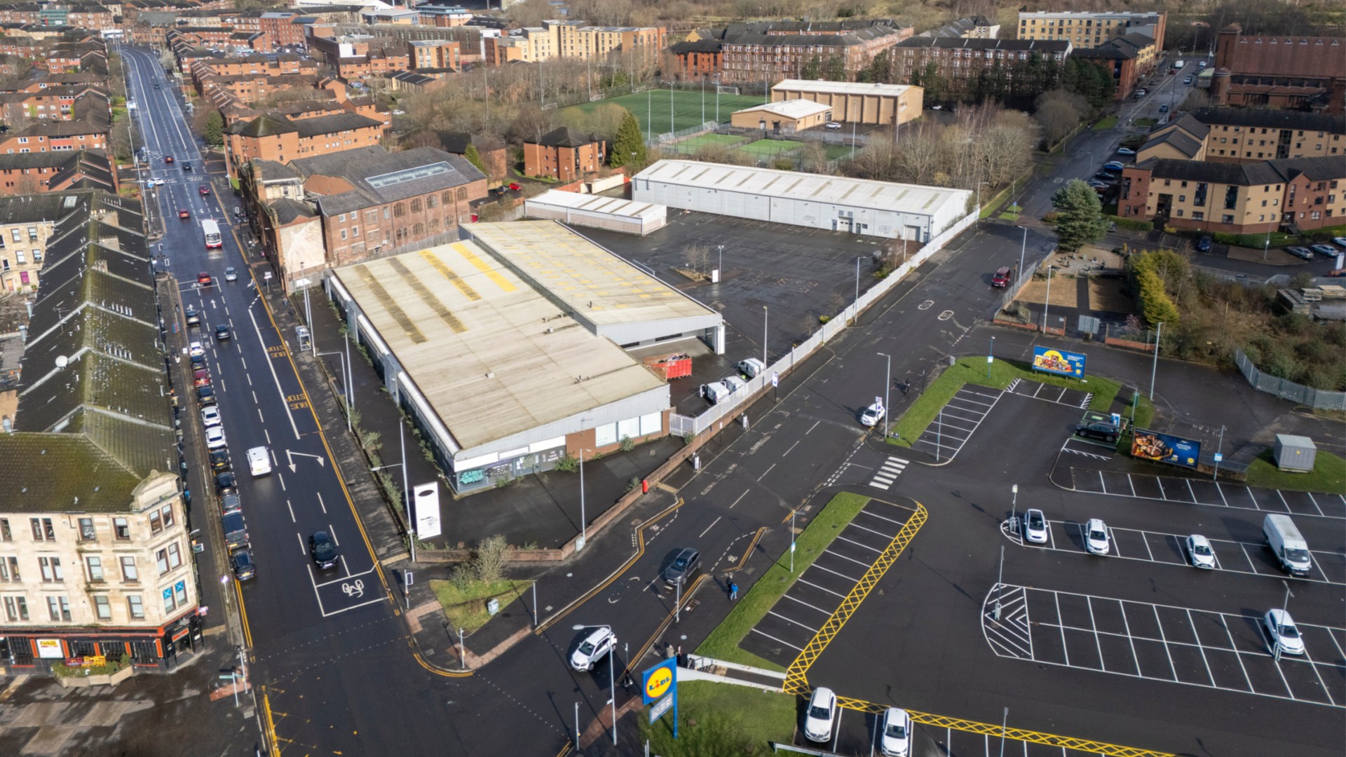 Aerial view of the former JLR/Lookers showroom and workshop site on Maryhill Road, Glasgow