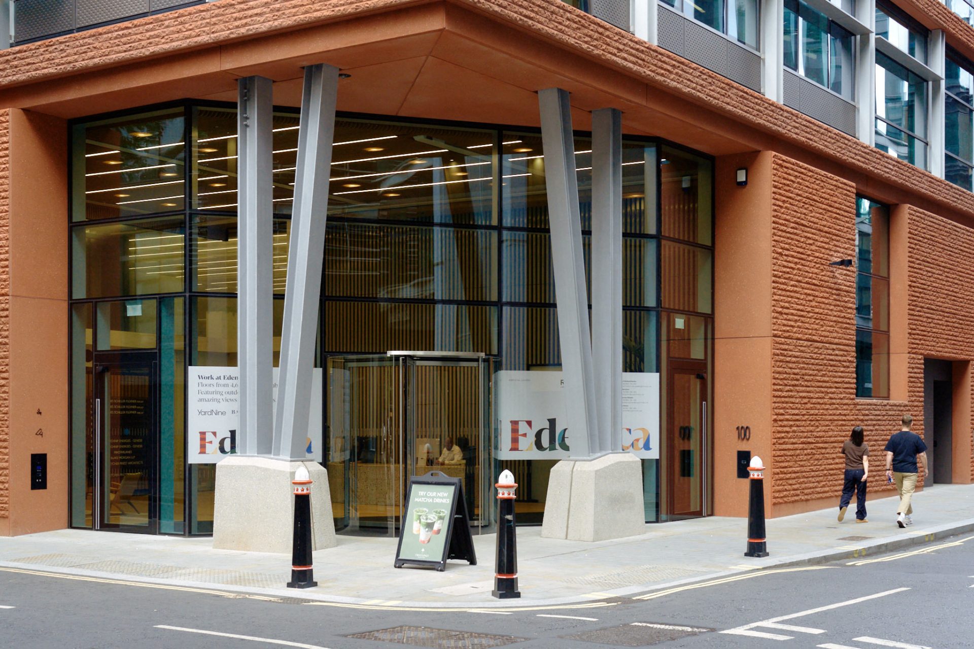 Entrance to Blake Morgan’s new London office at 100 Fetter Lane, with pedestrians outside