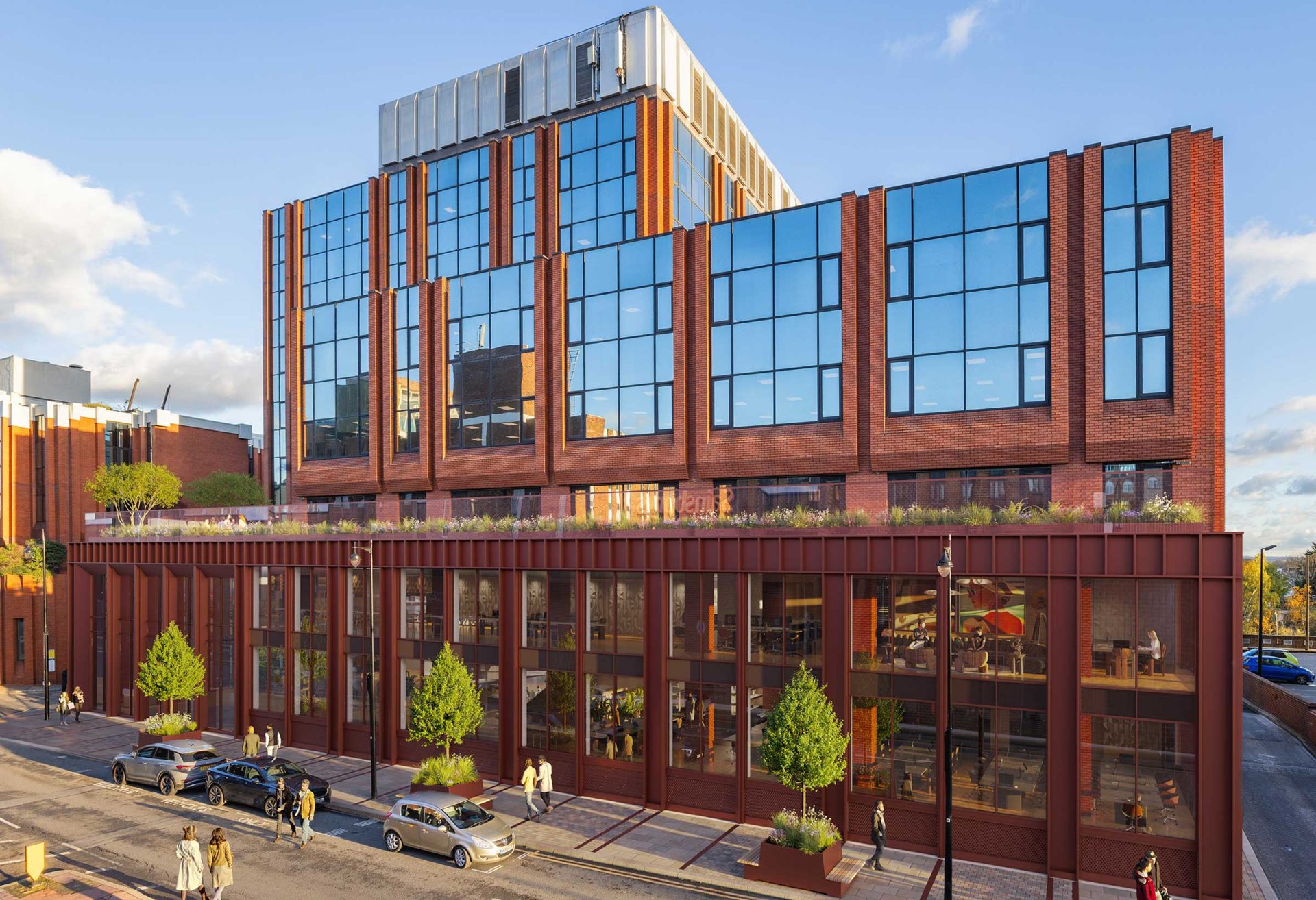 Rendering of FIVE St Georges House, a modern office building with glass windows and a landscaped street frontage.