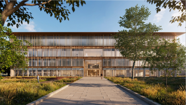 Modern multi-storey commercial building beyond a landscaped walkway