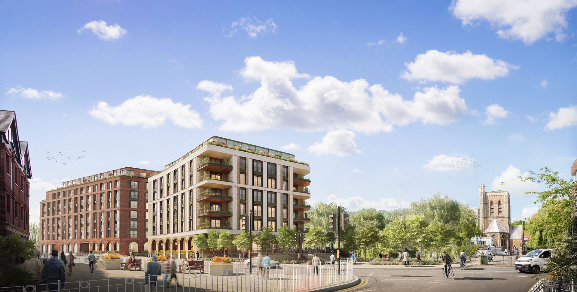 Architectural rendering of the planned St Mary’s Wharf development, with modern buildings beside a riverside public space.