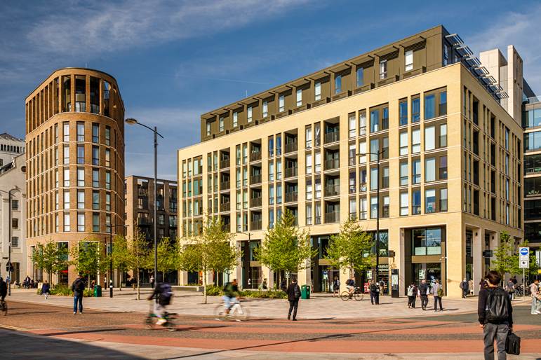Architectural rendering of a modern mixed-use building with pedestrians along the street
