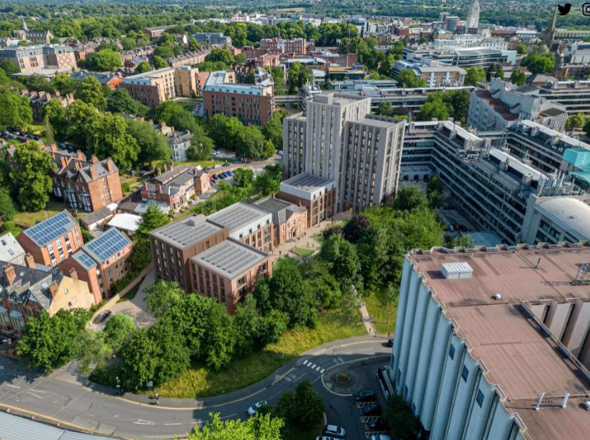 Aerial rendering of a proposed student accommodation development among trees and buildings in Leeds.