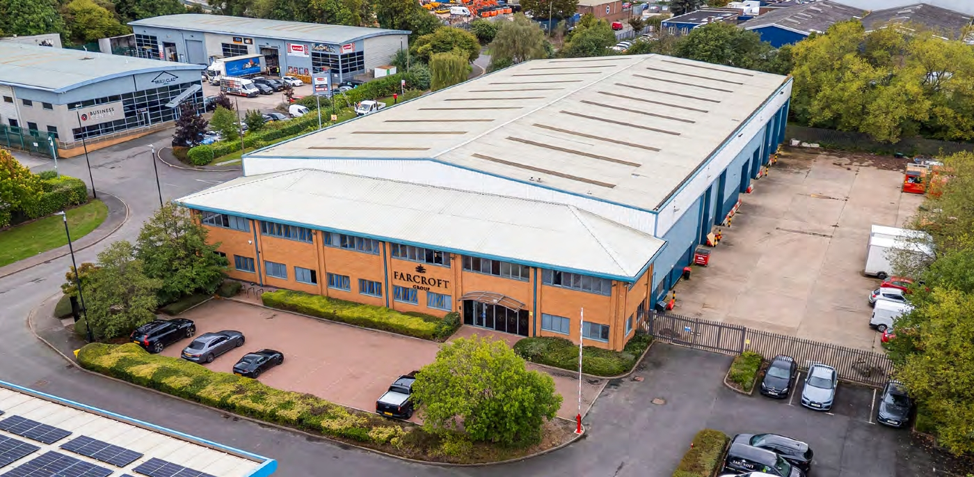 Aerial view of the Farcroft Restorations warehouse at Anchor Brook Industrial Estate, with parking and surrounding units.