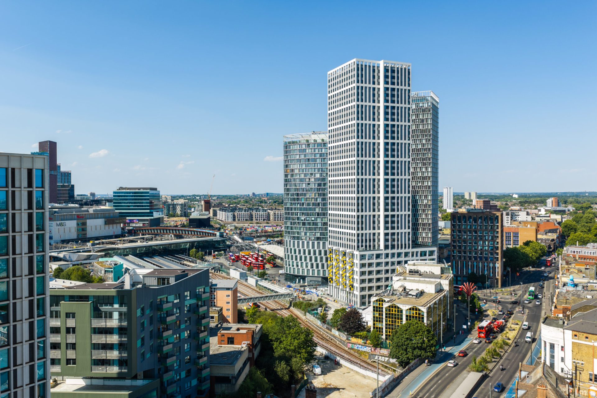 Hawthorne House development in London, with a tall modern building and surrounding city buildings.