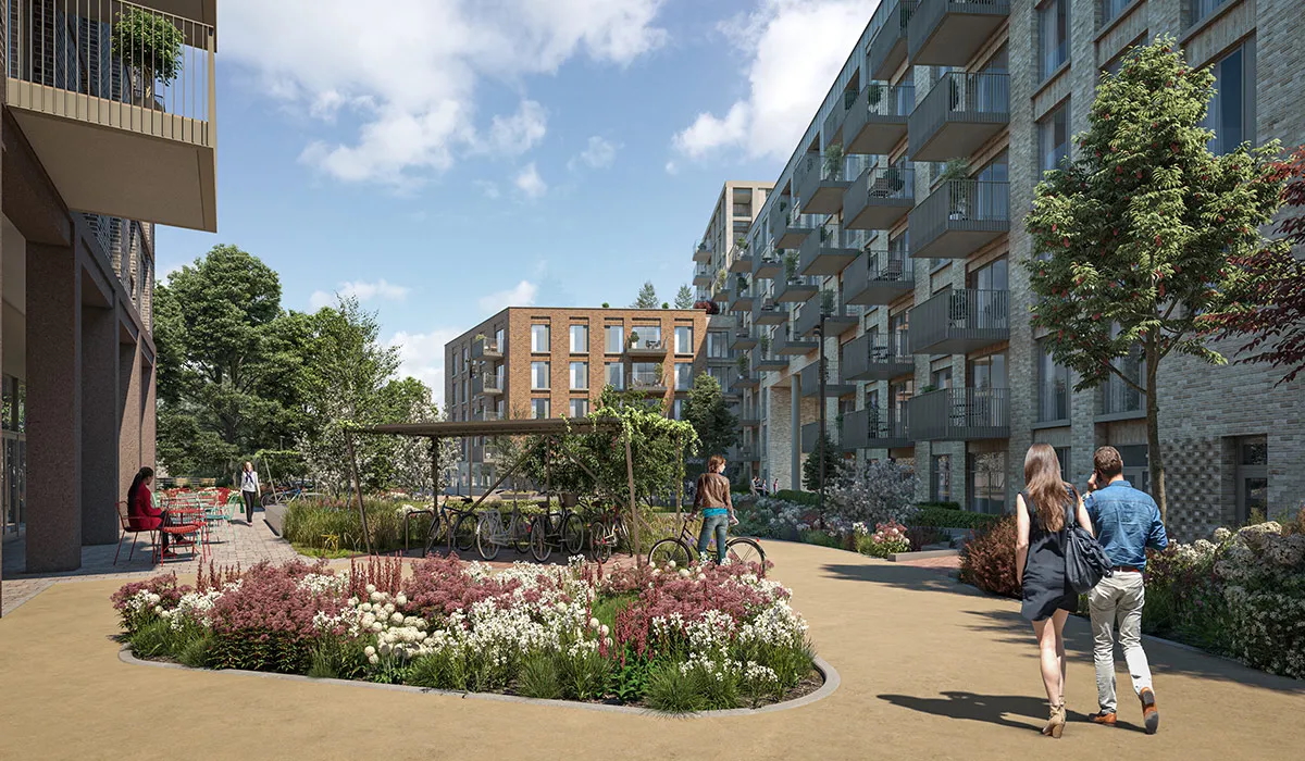 Rendering of Milltown Park apartments with landscaped paths and two people walking between the buildings.
