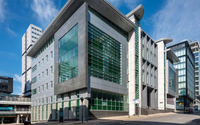 Exterior of a large glass and steel built office building