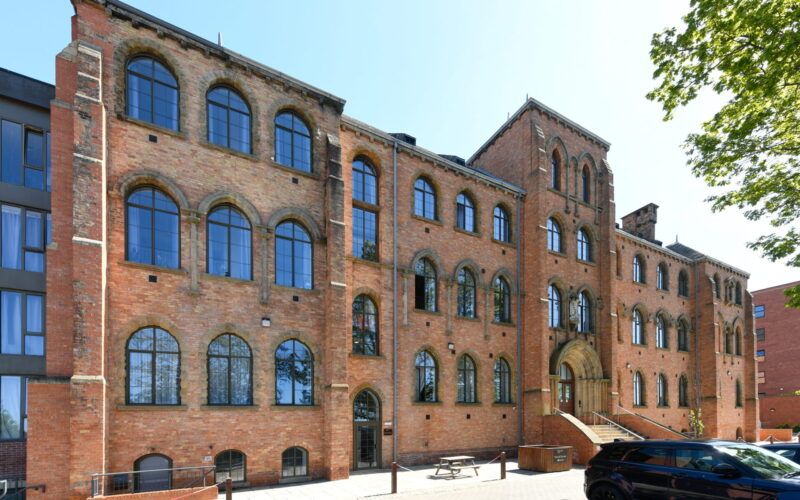 A traditional brick built warehouse building converted to residential