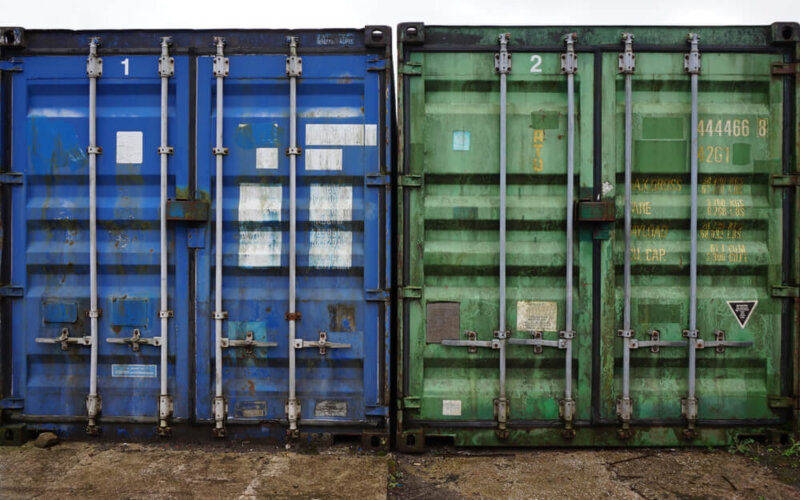 Blue,And,Green,Industrial,Steel,Shipping,Containers,Rear,View