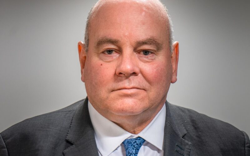 Eamonn Boylan, Chief Executive of the GMCA and TfGM wearing a white ribbon