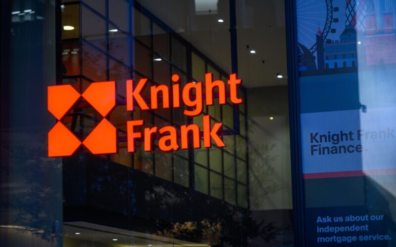 London,-,November,12,,2022:,Vibrant,Red,Frank,Knight,Sign