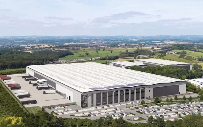 CGI aerial view of a large logistics development surrounded by green fields and woodland