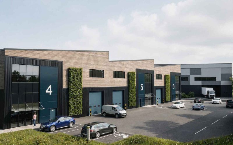 CGI view of a series of numbered industrial units with car parking in front
