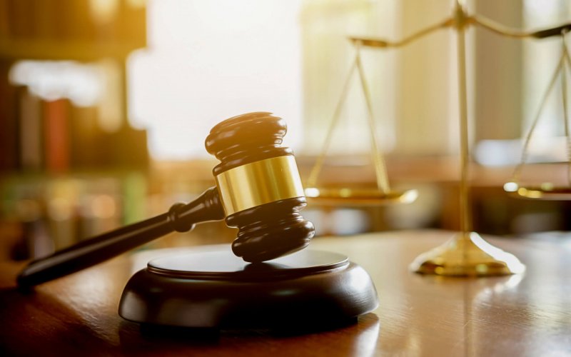 Judge,Gavel,With,Justice,Lawyers,Having,Team,Meeting,At,Law