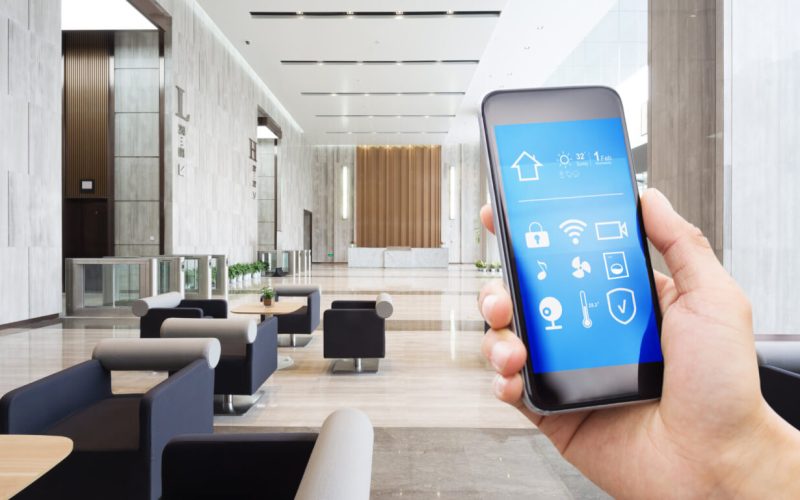 Mobile,Phone,With,App,On,Smart,Home,In,Spacious,Hall