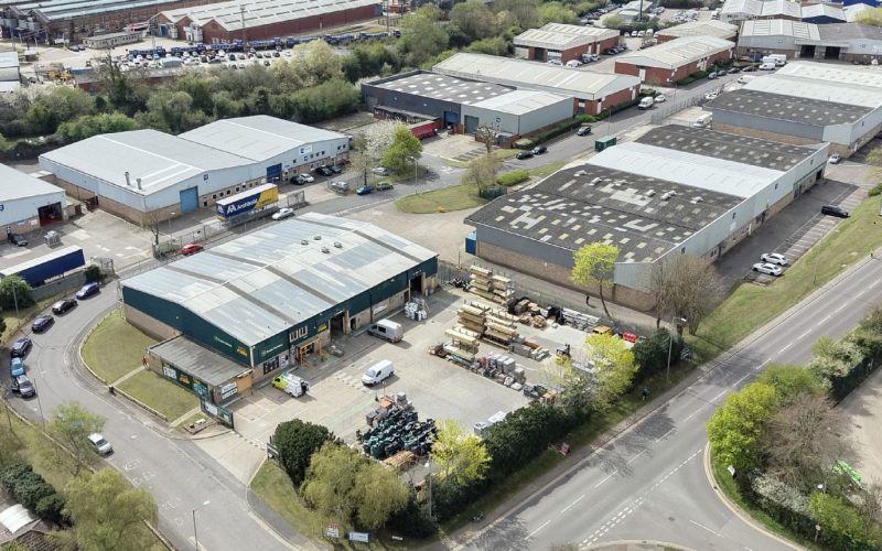 Aerial view of Canon Industrial Park’s industrial units, trade counters, roads, parking and greenery in Milton Keynes.