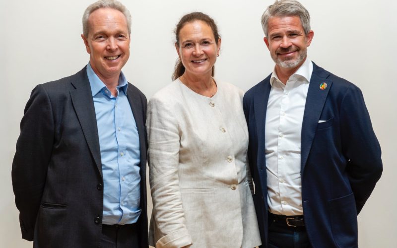 Hilde Tonne and Jonathon Bond stand with Urban Partners executive chairman Mikkel Bülow-Lehnsby.
