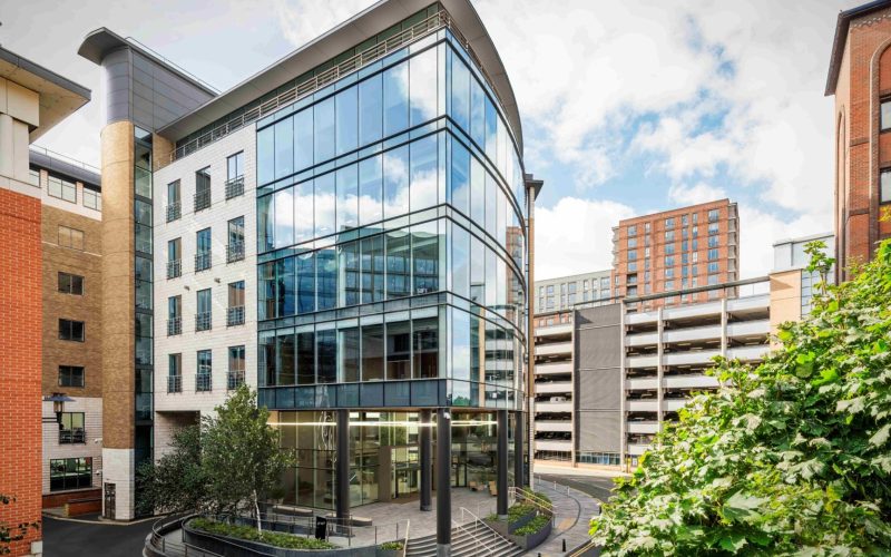 Architectural rendering of 2 Wellington Place, a modern glass-fronted office building in Leeds.