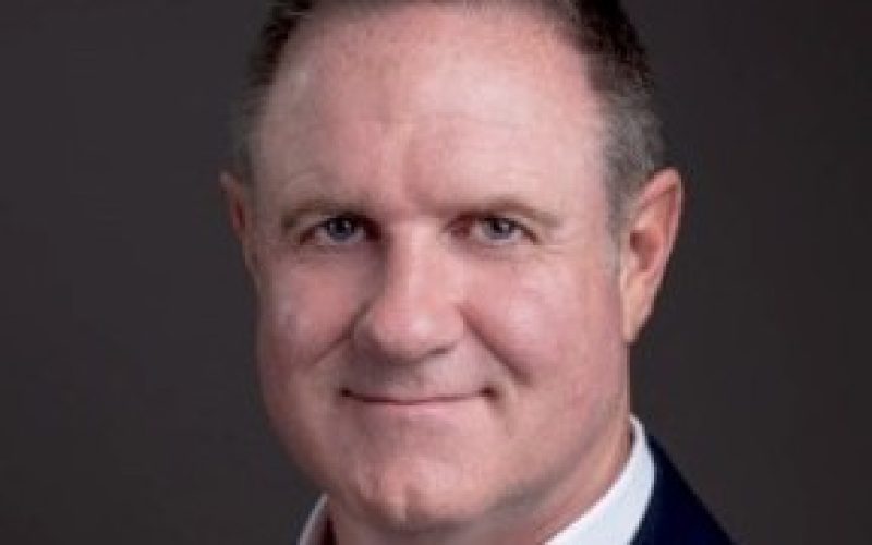 Headshot of Darren Simpson, managing director of BidX1's UK business.