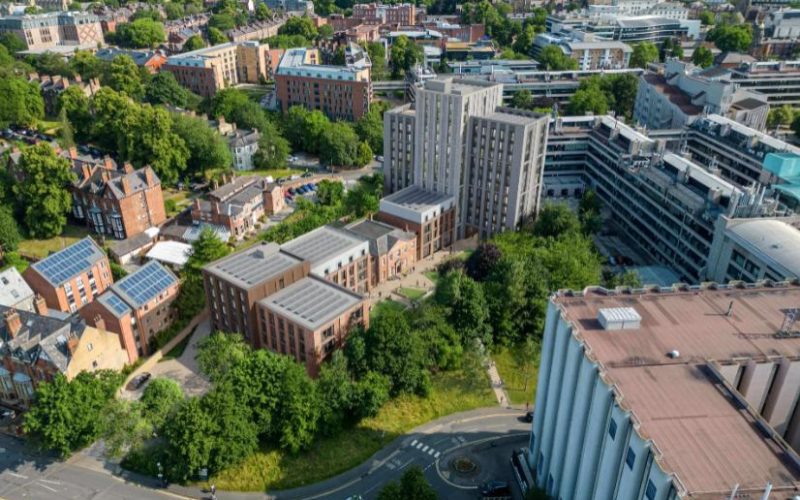 Aerial rendering of a proposed student accommodation development among trees and buildings in Leeds.