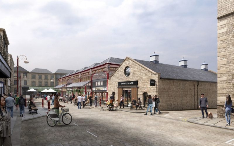 Architectural rendering of Huddersfield Market’s refurbished entrance, with a café sign and people outside.