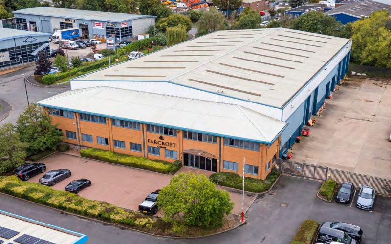 Aerial view of the Farcroft Restorations warehouse at Anchor Brook Industrial Estate, with parking and surrounding units.