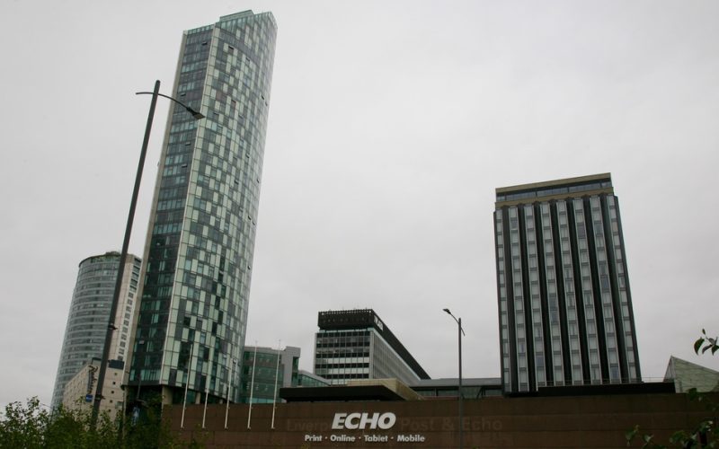 Rendering of the former Liverpool Daily Post & Echo printing hall site, with surrounding city buildings and the Echo sign.