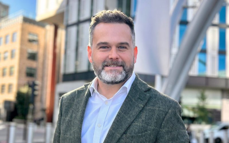 Finn Ledwidge, newly appointed director in Strettons’ office agency team, wearing a dark suit and light blue shirt.