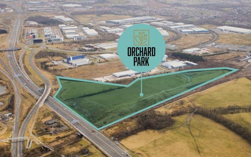 Aerial view of the proposed Orchard Park industrial and logistics site at Eurocentral, outlined in green.