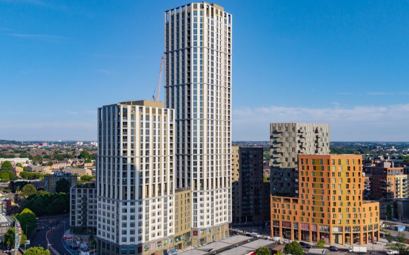 Architectural rendering of high-rise residential buildings and ground-floor retail at a London development.