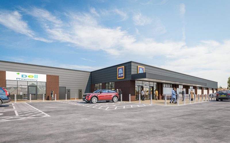 Architectural rendering of the proposed Aldi store at The Deepings, showing its entrance, parking lot and cars.