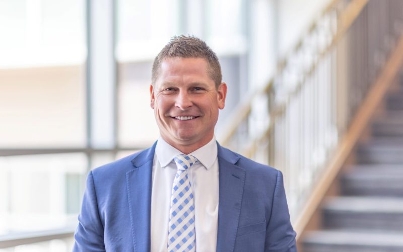 Andy Yosten, HDR’s new building engineering services president, in a suit and tie