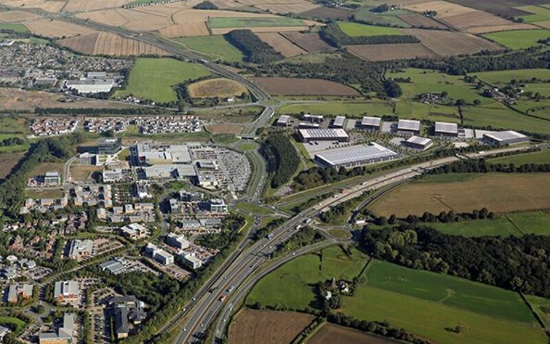 A CGI aerial view of the proposed Integral logistics scheme in Leeds surrounded by Thorpe Park and lots of fields
